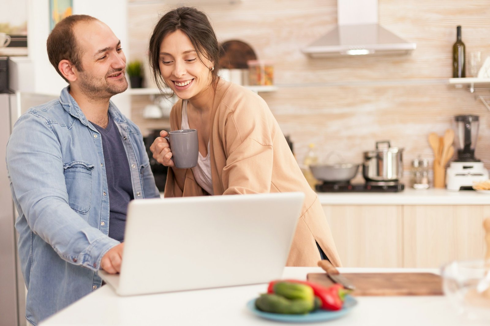 Couple in front of laptop